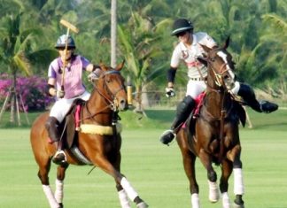 Thai Polo and St. Regis battle for possession of the ball at the Queen’s Cup Pink Polo event held at Thai Polo Club in Pattaya, Saturday, February 19.